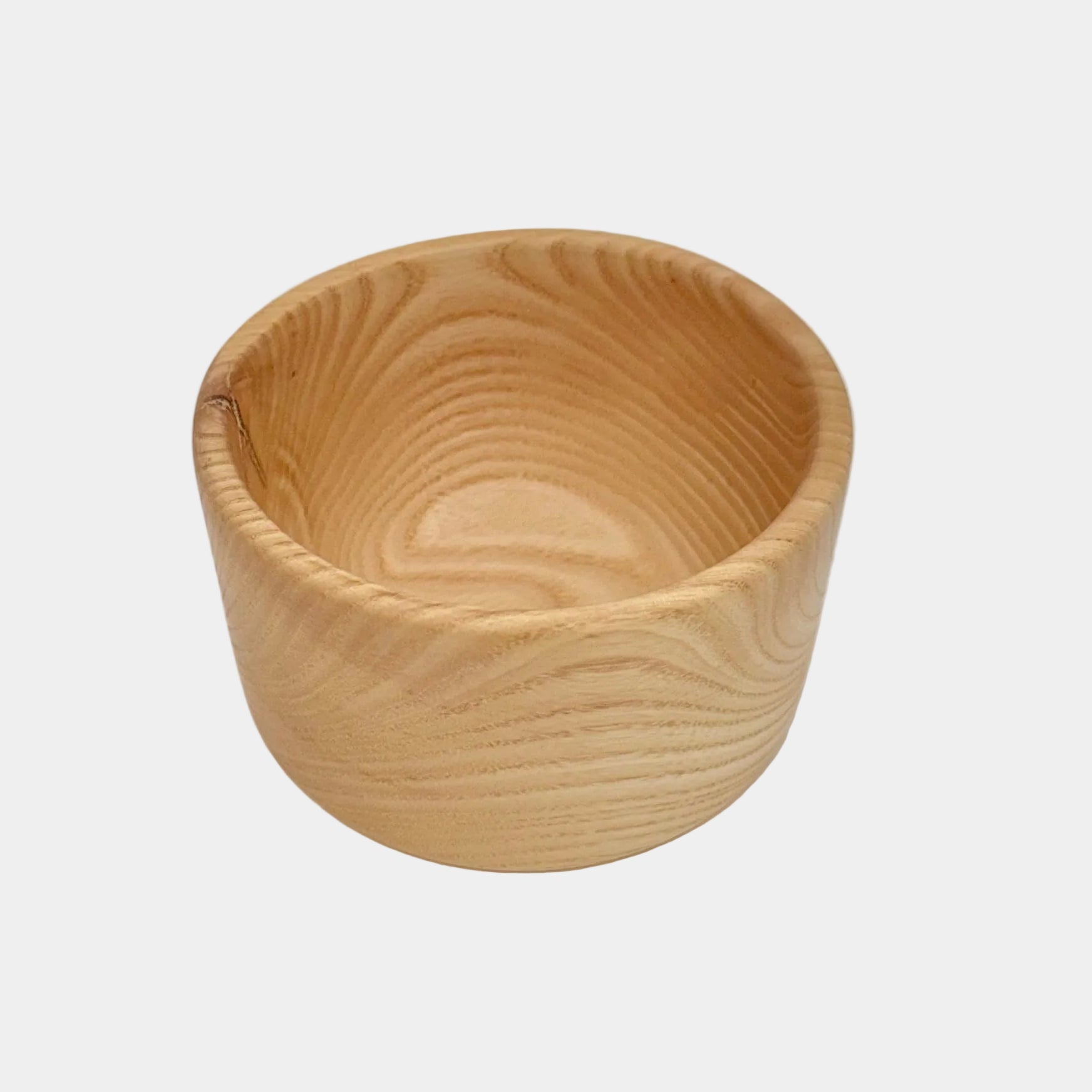 Wooden bowl on a white background