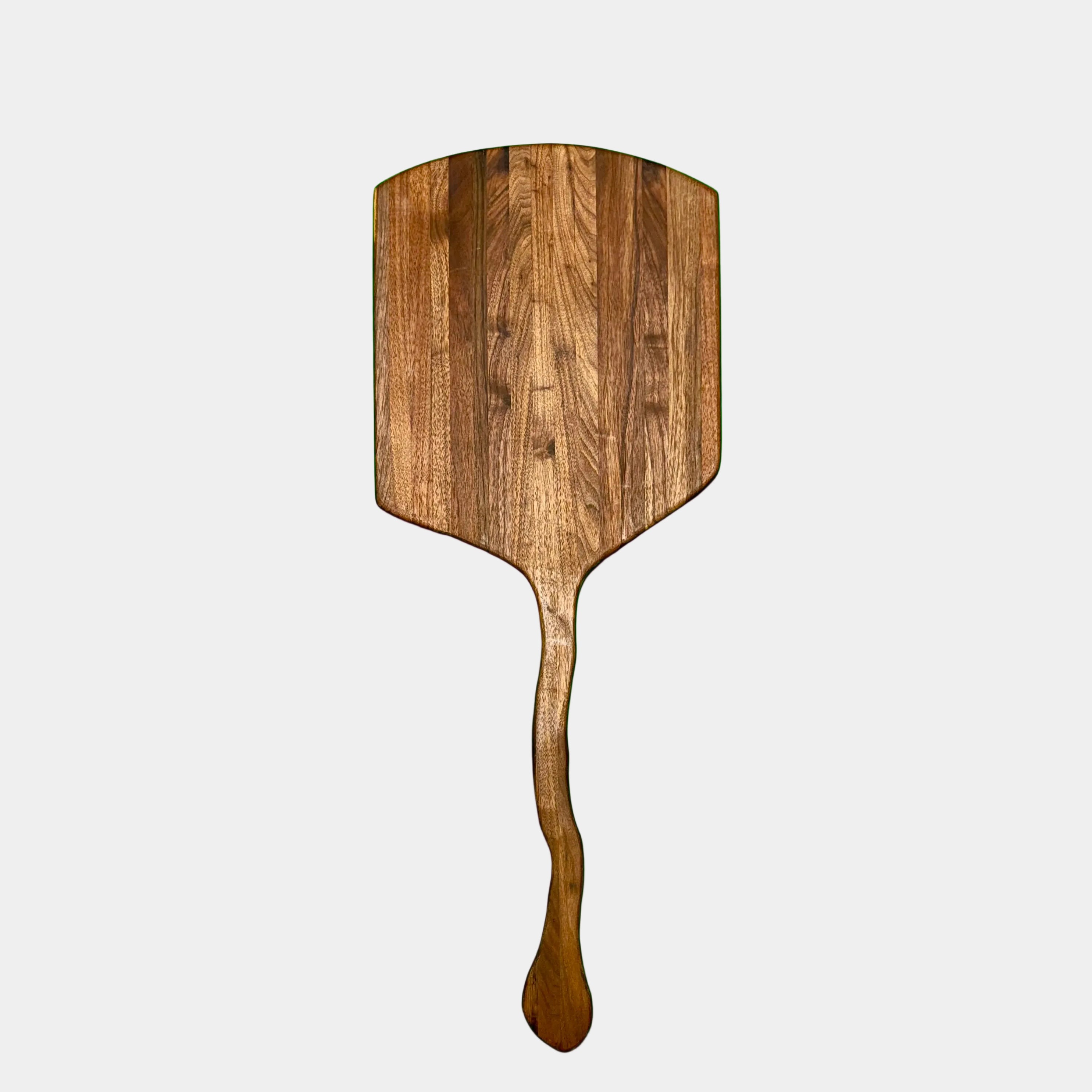 A beautiful walnut wood pizza peel