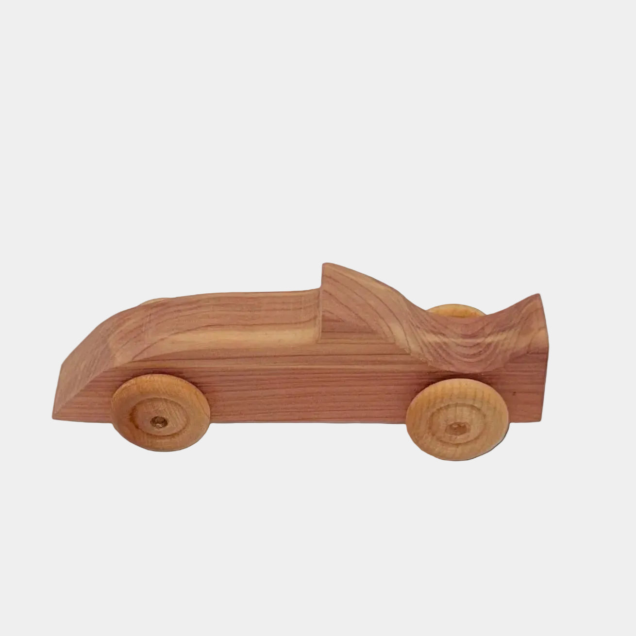 Wooden toy car on a white background
